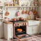 cherry pie miniature in a Vintage-style kitchen with copper appliances and floral wallpaper